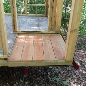 Front porch, which is located at the back of the actual trailer. 